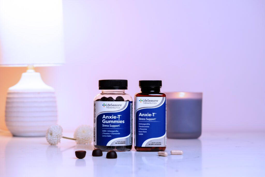 anxie-t gummies and anxie-t supplement on a counter with a calming background